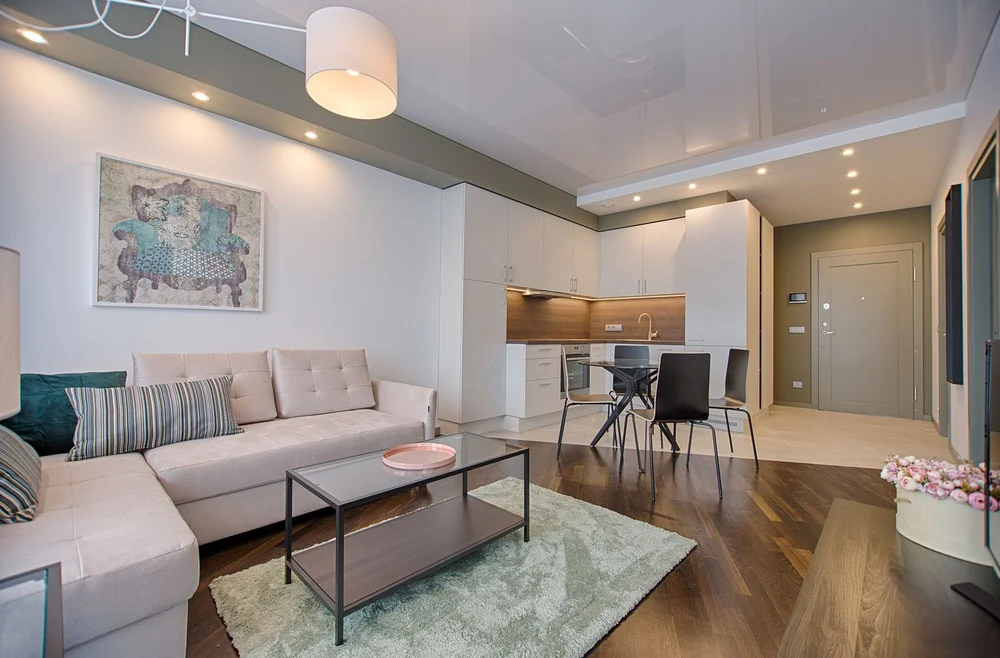 Quiet luxury interior living space with custom joinery and natural light in Mumbai